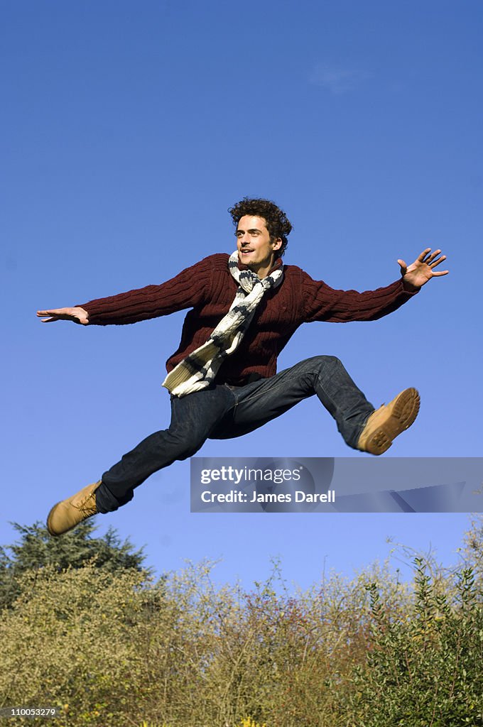 Man jumping in air