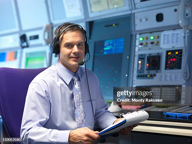 air traffic controller in radar room - lotse stock-fotos und bilder
