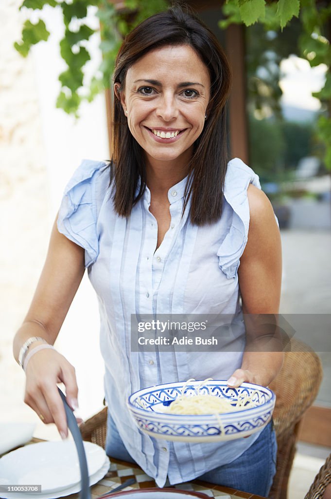 Mother serving food