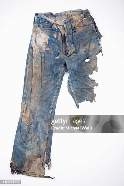 extremely worn out jeans - trousers stock-fotos und bilder