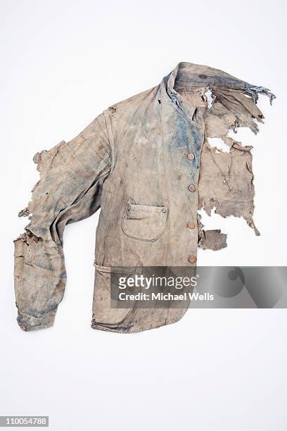 extremely damaged denim jacket - stained shirt stock pictures, royalty-free photos & images
