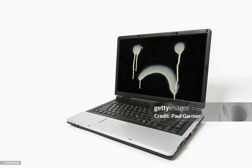 Sad Reflection Computer Monitor A Laptop Monitor With A Sad Face Spray Painted On It High-Res Stock ...