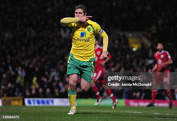 Grant Holt celebrates his first goal during the npower Chapionship match between Norwich City and Bristol City at Carrow Road on March 14, 2011 in...