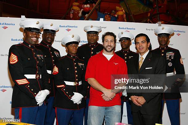 Joey Fatone Bank of America's Leo Gonzalez, and U.S. Marines pose at the Bank Of America Keep The Change Round Up Relay a shopping spree which Joey...