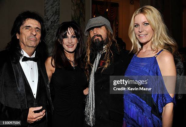 Inductee Alice Cooper, Sheryl Cooper and Rob Zombie attends a dinner for the 26th annual Rock and Roll Hall of Fame Induction Ceremony at The...