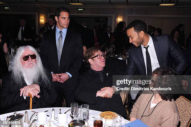 Inductee Leon Russell, presenter Elton John and John Legend attend a dinner for the 26th annual Rock and Roll Hall of Fame Induction Ceremony at The...