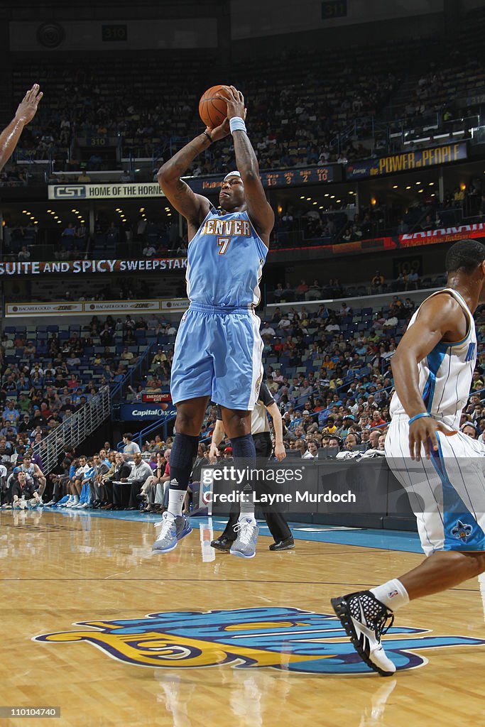 Al Harrington of the Denver Nuggets shoots against the New Orleans... News Photo Getty Images