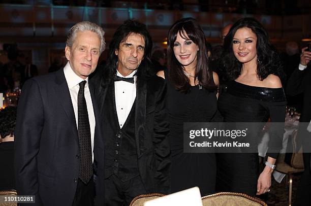Michael Douglas, Alice Cooper, Sheryl Cooper, and Catherine Zeta-Jones attend a dinner for the 26th annual Rock and Roll Hall of Fame Induction...