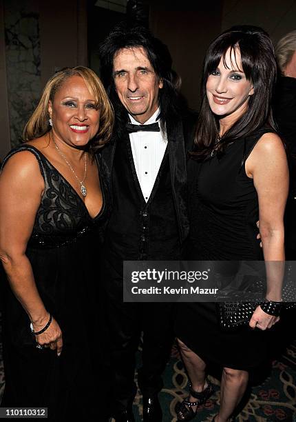 Inductees Darlene Love and Alice Cooper and Sheryl Cooper attend a dinner for the 26th annual Rock and Roll Hall of Fame Induction Ceremony at The...