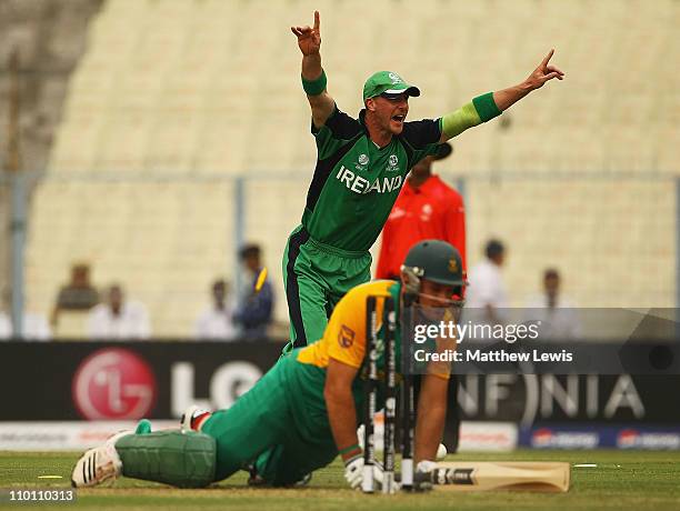 John Mooney of Ireland celebrates, after running out Graeme Smith of South Africa during the 2011 ICC World Cup Group B match between Ireland and...