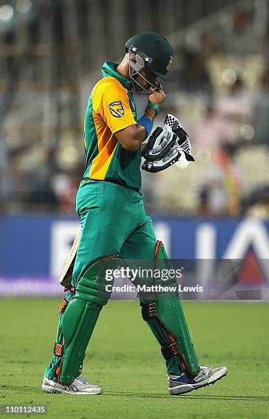 Duminy of South Africa walks off, after he was caught by Kevin O'Brien of Ireland off the bowling of John Mooney during the 2011 ICC World Cup Group...