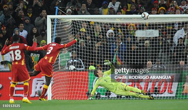 Uruguay's goalkeeper Fernando Muslera reacts after Ghana's striker Asamoah Gyan missed a penalty during the 2010 World Cup quarter final Uruguay vs...