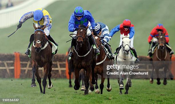 Ruby Walsh riding Hurricane Fly clear the last to win The Stan James Champion Hurdle Challenge Trophy from Peddlers Cross at Cheltenham racecourse on...