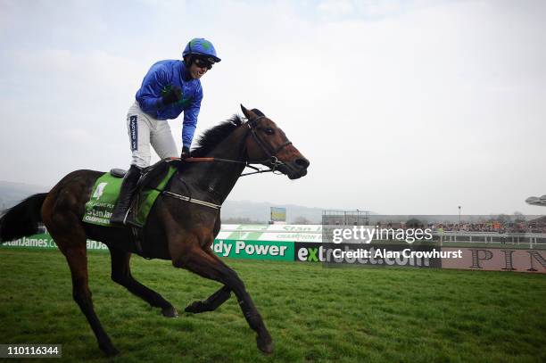 Ruby Walsh riding Hurricane Fly win The Stan James Champion Hurdle Challenge Trophy at Cheltenham racecourse on March 15, 2011 in Cheltenham, England