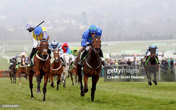 Ruby Walsh wins the Stan James Champion Hurdle Challenge Trophy on Hurricane Fly at Cheltenham Racecourse on Centenary Day, March 15, 2011 in...