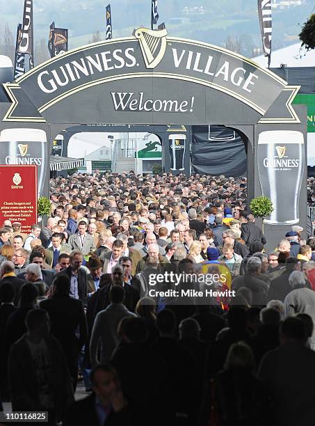 Crowds flock to the first day of the festival at Cheltenham Racecourse on March 15, 2011 in Cheltenham, England.