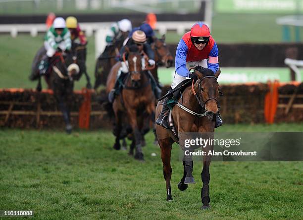 Ruby Walsh riding Quevega clear the last to win The David Nicholson Mares' Hurdle at Cheltenham racecourse on March 15, 2011 in Cheltenham, England