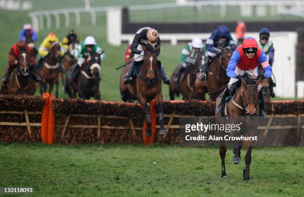 Ruby Walsh riding Quevega clear the last to win The David Nicholson Mares' Hurdle at Cheltenham racecourse on March 15, 2011 in Cheltenham, England