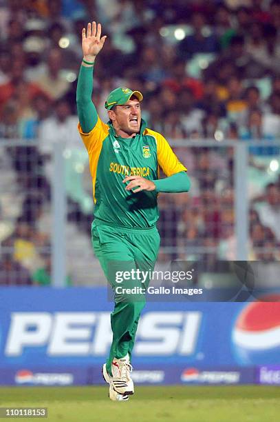 Graeme Smith of South Africa celebrates the wicket of Niall O'Brien of Ireland during the ICC Cricket World Cup match between South Africa and...