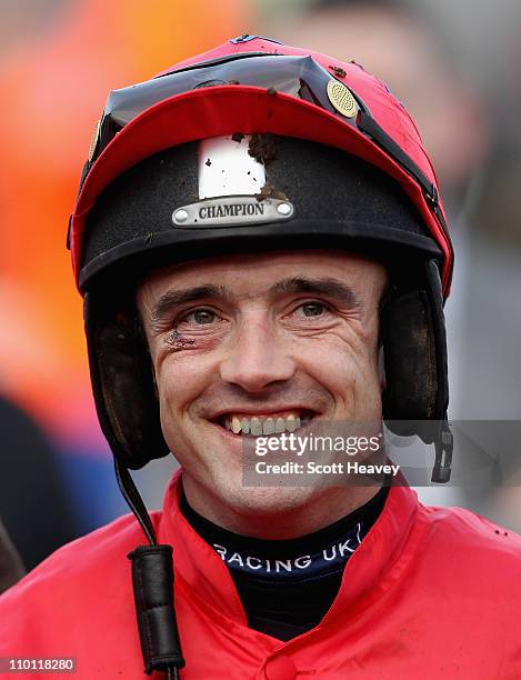 Ruby Walsh celebrates after winning the David Nicholson Mares' Hurdle Race on Quevega at Cheltenham Racecourse on March 15, 2011 in Cheltenham,...