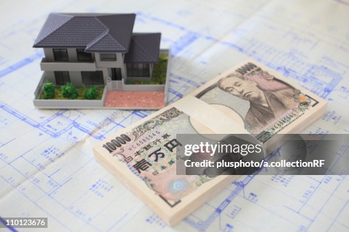 Bank Note House Stack Of Notes And Model House High-Res Stock Photo - Getty Images