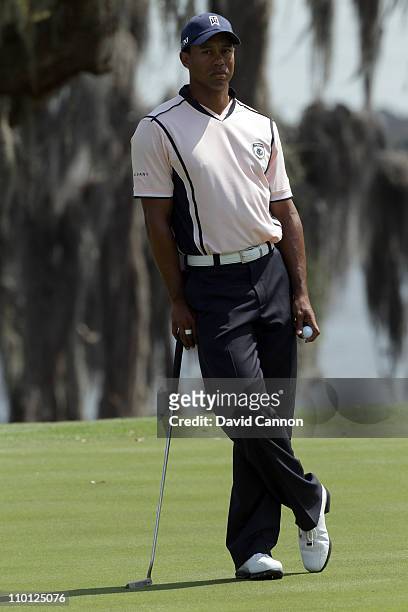 Tiger Woods of the USA on the 9th hole during the second day of the 2011 Tavistock Cup at Isleworth Golf and Country Club on March 15, 2011 in...