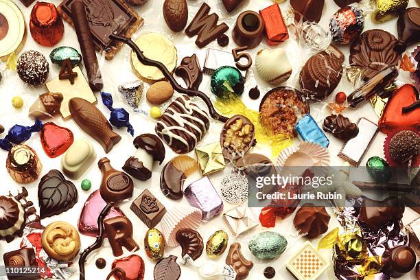 group of chocolate candies - chocolate pieces stock pictures, royalty-free photos & images