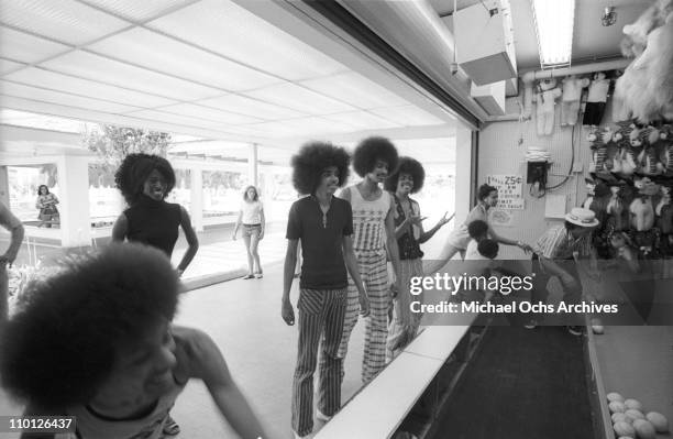 And B group The Sylvers play games at Magic Mountain on June 22, 1973 in Valencia, California.