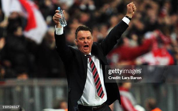 Head coach Louis van Gaal of Muenchen celebrates after Thomas Mueller scored his teams second goal during the UEFA Champions League round of 16...