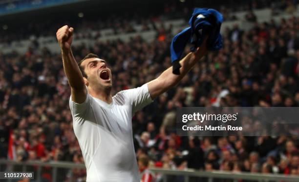 Goran Pandev of Milan celebrates after he scores his team's 3rd goal during the UEFA Champions League round of 16 second leg match between FC Bayern...