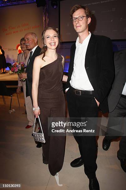 Anna Brueggemann and partner attend the 'Deutscher Hoerfilmpreis 2011' at the Atrium Deutsche Bank on March 15, 2011 in Berlin, Germany.