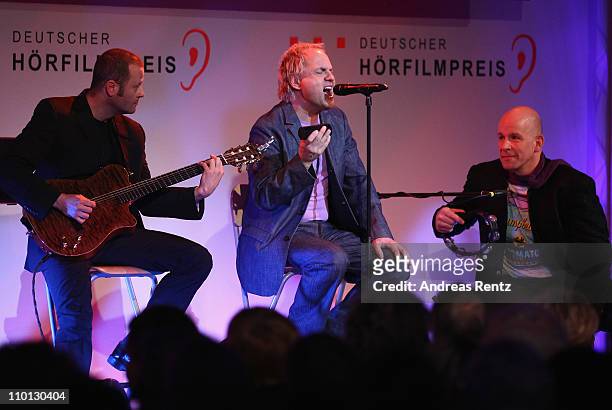 Actor and singer Uwe Ochsenknecht performs on stage during the 'Deutscher Hoerfilmpreis 2011' at the Atrium Deutsche Bank on March 15, 2011 in...