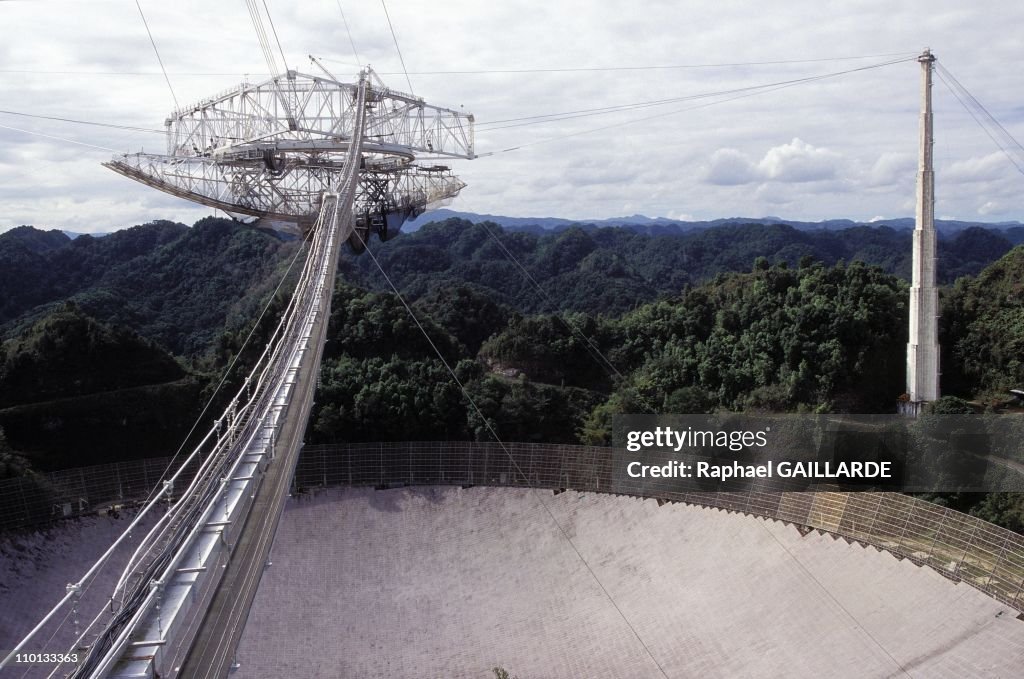 Arecibo, the largest radio telescope in the world located in Puerto Rico in restoration in February, 1996.