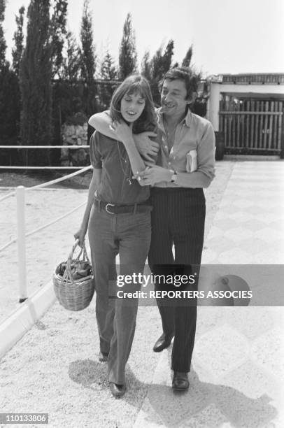 Jane Birkin and Serge Gainsbourg on a karting racing circuit in 1970.