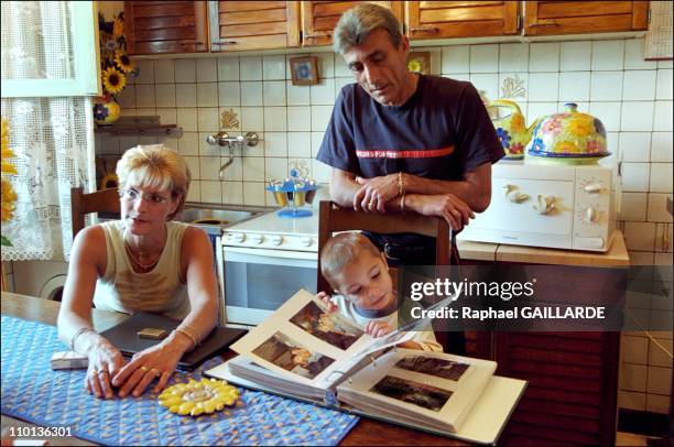 Gwilherm, victim of the very rare Stuve Wiedmann syndrome in Nice, France in May, 2001 - He with his parents Francoise Sanchez and fireman Serge...