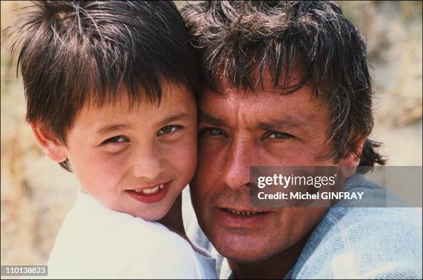 Alain Delon, Alain Musy at the film "The way" in France on September 1, 1986.