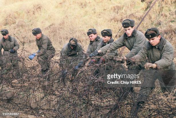 Dismantle of the "Iron Curtain" at Czech Austria border in Republique Tcheque in December , 1989.