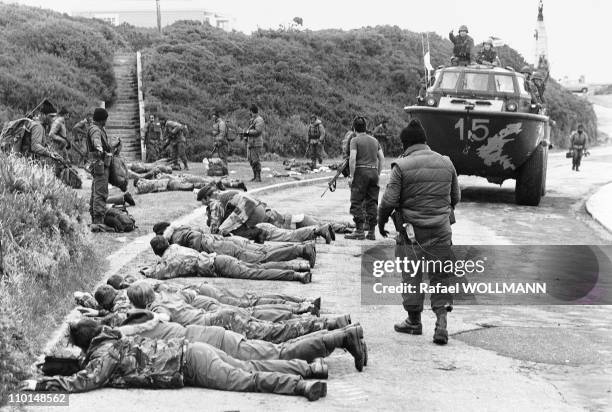 The Falklands War in Port Stanley, Falkland Islands in April, 1982 - British troops surrender to the Argentines .