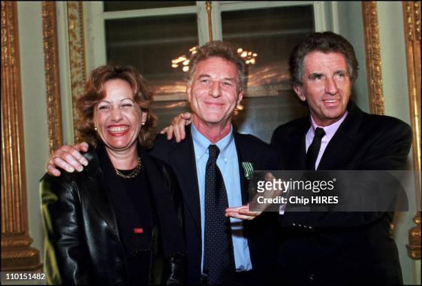Famous french journalist Robert Namias decorated by Minister of culture Jack Lang in Paris, France on December 22, 2002 - In photo: Anne Barrere,...
