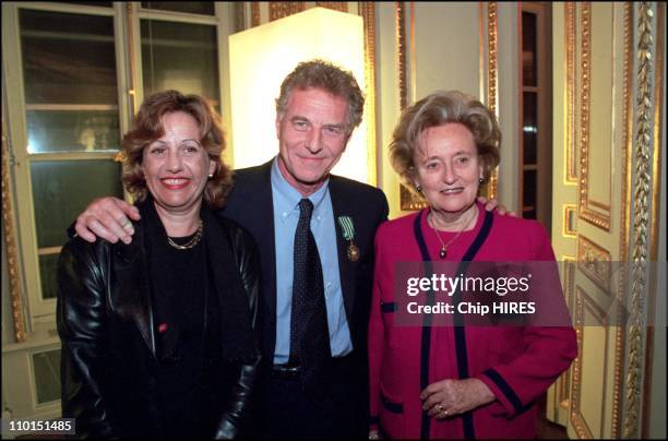 Famous french journalist Robert Namias decorated by Minister of culture Jack Lang in Paris, France on December 22, 2002 - In photo: Anne Barrere,...