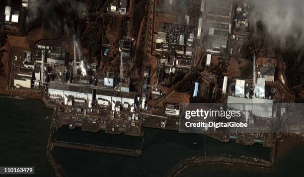 In this satellite view, the damaged Fukushima Dai-ichi Nuclear Power plant is seen after a massive earthquake and subsequent tsunami, on March 16,...