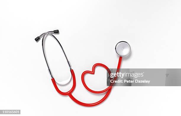 close up of heart shaped stethoscope - red stethoscope stock pictures, royalty-free photos & images