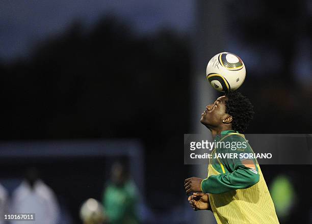 Cameroon defender Nicolas Nkoulou controlls a ball during a public training session at the Northlands School in Durban on June 10, 2010 a day before...