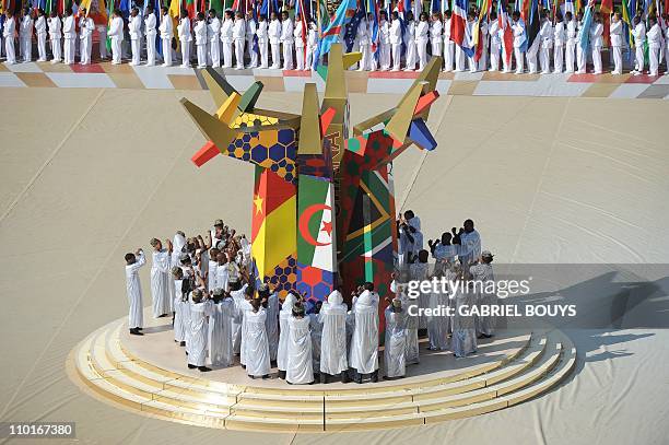 Entertainers perform during the opening ceremony of the 2010 FIFA World Cup on June 11, 2010 at Soccer City stadium in Soweto, suburban Johannesburg....