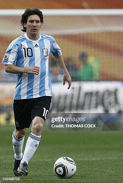 Argentina's striker Lionel Messi kicks the ball during their Group B first round 2010 World Cup football match on June 12, 2010 at Ellis Park stadium...