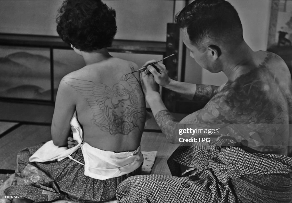 Tattoo Artist At Work