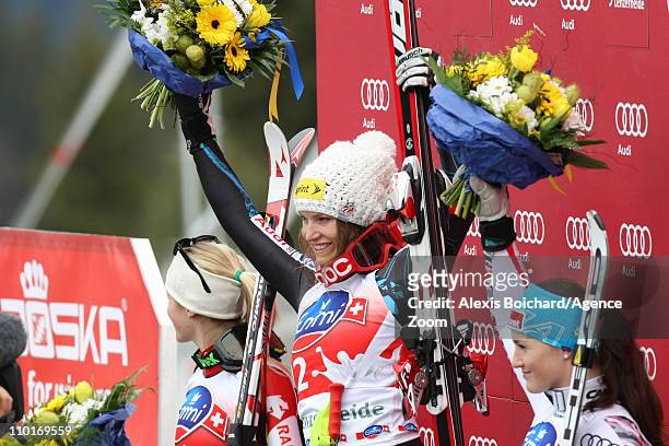 Julia Mancuso of the USA takes 1st place, Lara Gut of Switzerland takes 2nd place, Elisabeth Goergl of Austria takes 3rd place during the Audi FIS...