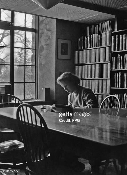 Lisa Leighton of Fairfield, Connecticut studying in the library at the Sarah Lawrence College in New York in 1948.