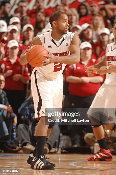 Preston Knowles of the Louisville Cardinals looks to pass the ball during the Finals of the 2011 Big East Men's Basketball Tournament presented by...