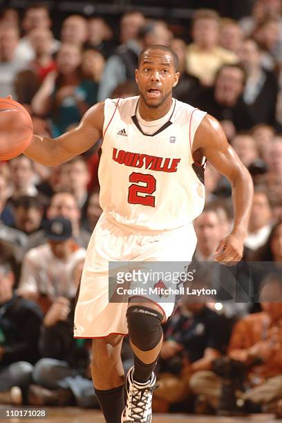 Preston Knowles of the Louisville Cardinals dribbles up court during the Finals of the 2011 Big East Men's Basketball Tournament presented by...